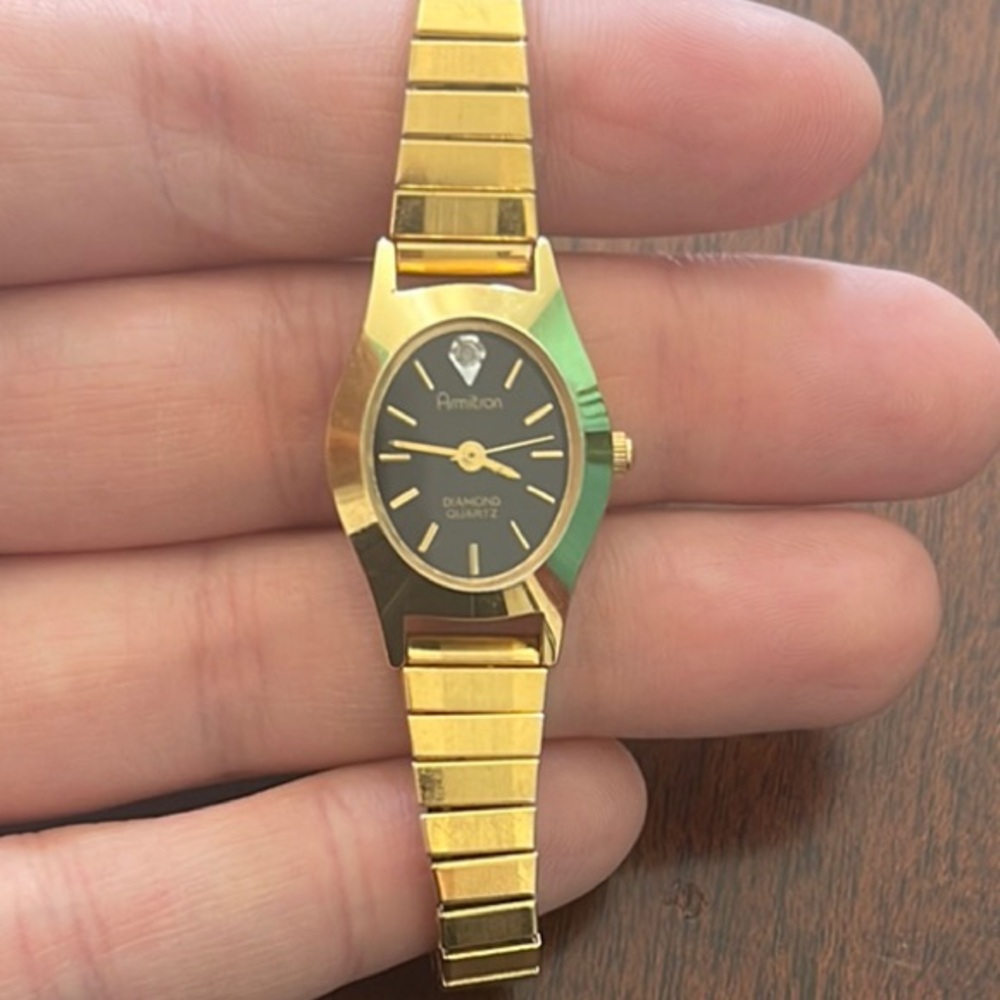 Gold and Black Amitron Watch
